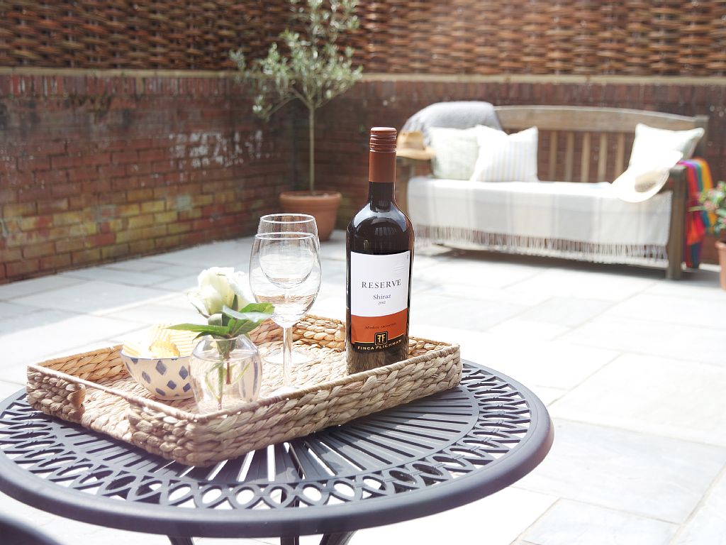 Enjoy a glass of wine in your private courtyard.